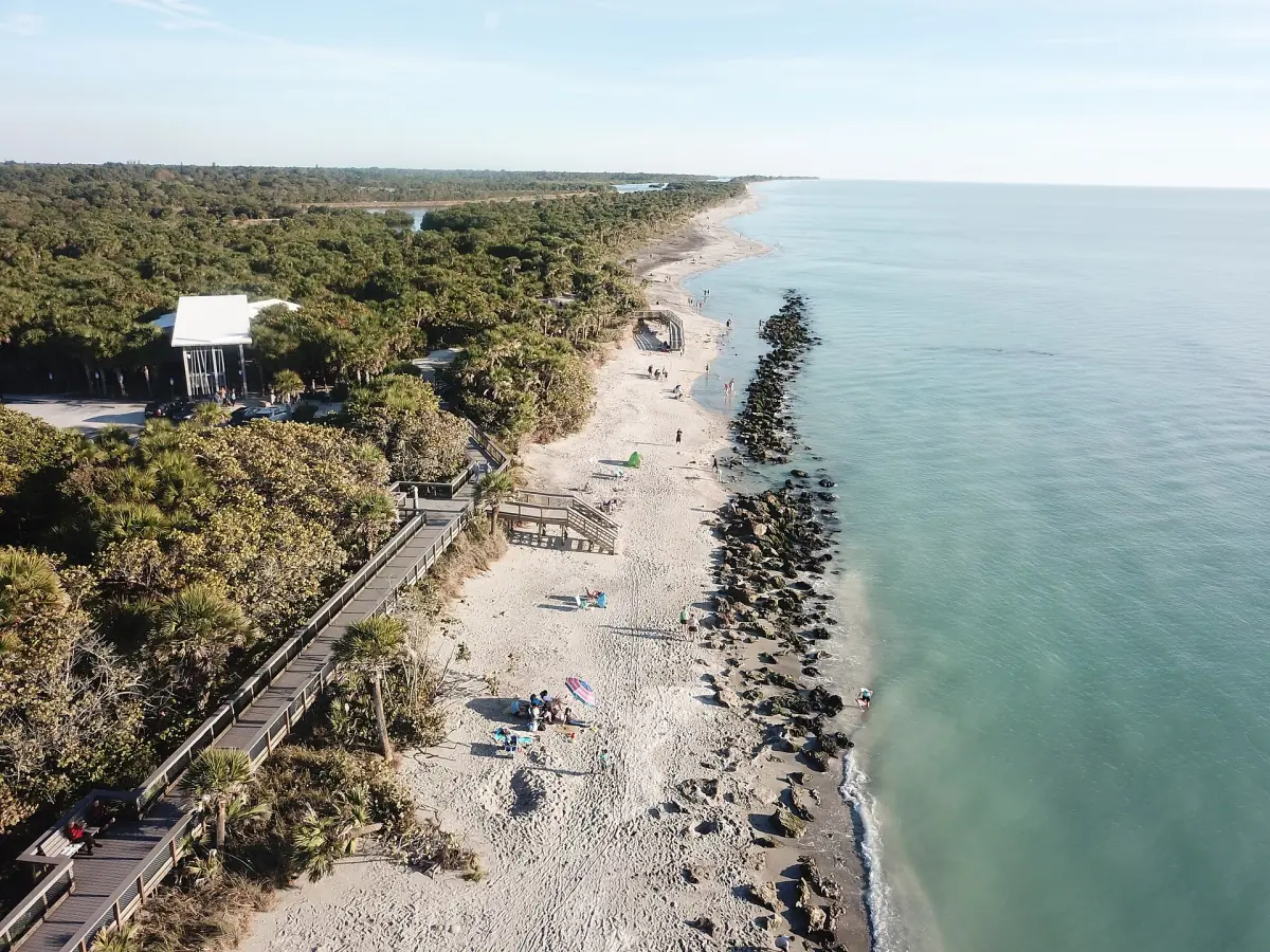 Aerial view of Caspersen Beach near Venice with boardwalk and rock groins
