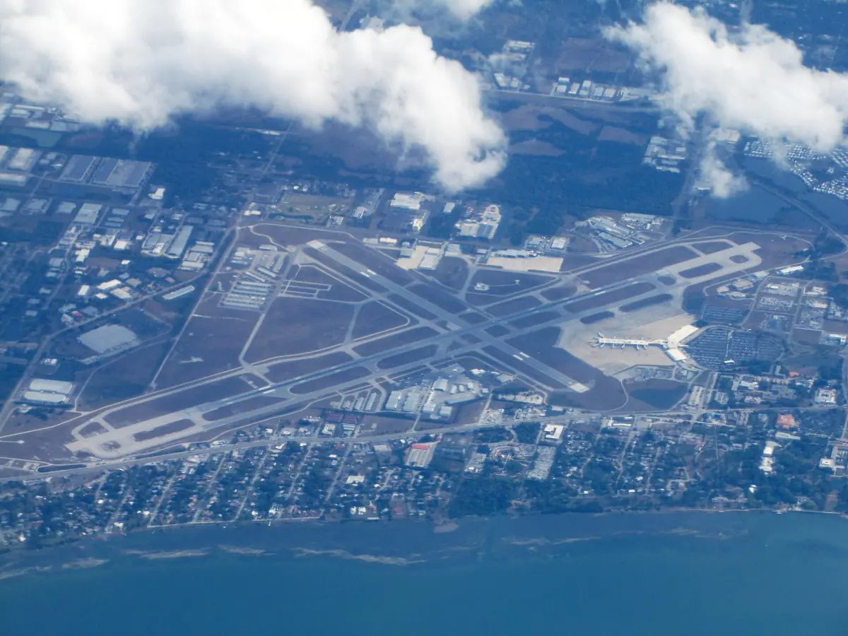 Aerial view of the runways of Sarasota-Bradenton Airport and surrounding streets